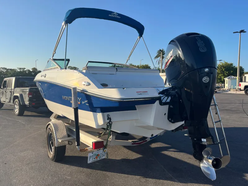 Slide: The Image of 2020 Monterey M205 boat on trailer with outboard motor. - 16