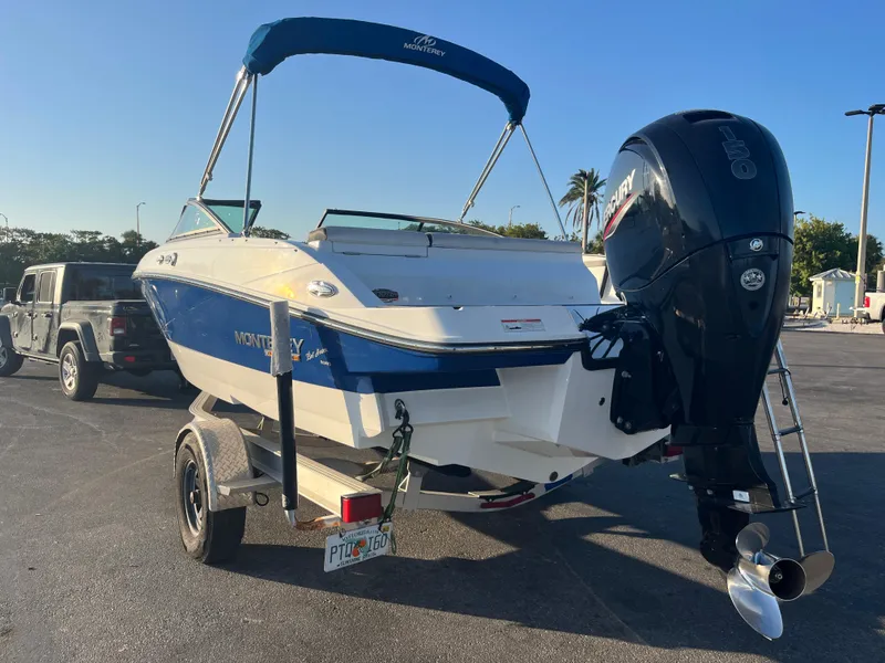 Slide: The Image of 2020 Monterey M205 boat on trailer with outboard motor. - 17