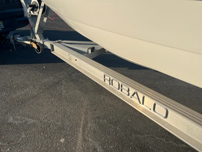 Slide: The Image of Boat trailer with Robalo branding, attached to a 2020 Monterey M205. - 21