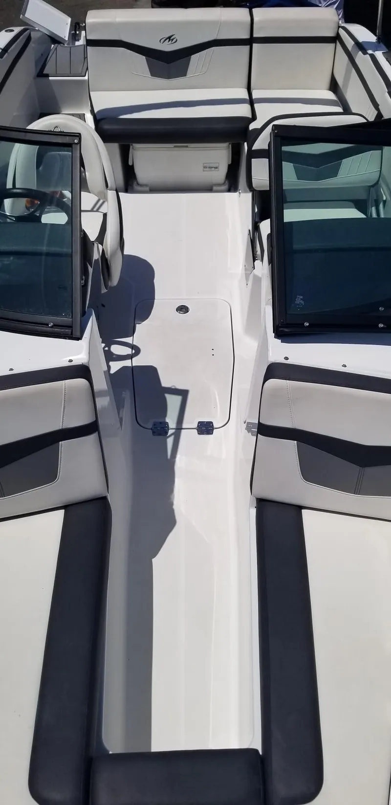 Slide: The Image of 2020 Monterey M205 boat interior with white and black seating. - 30