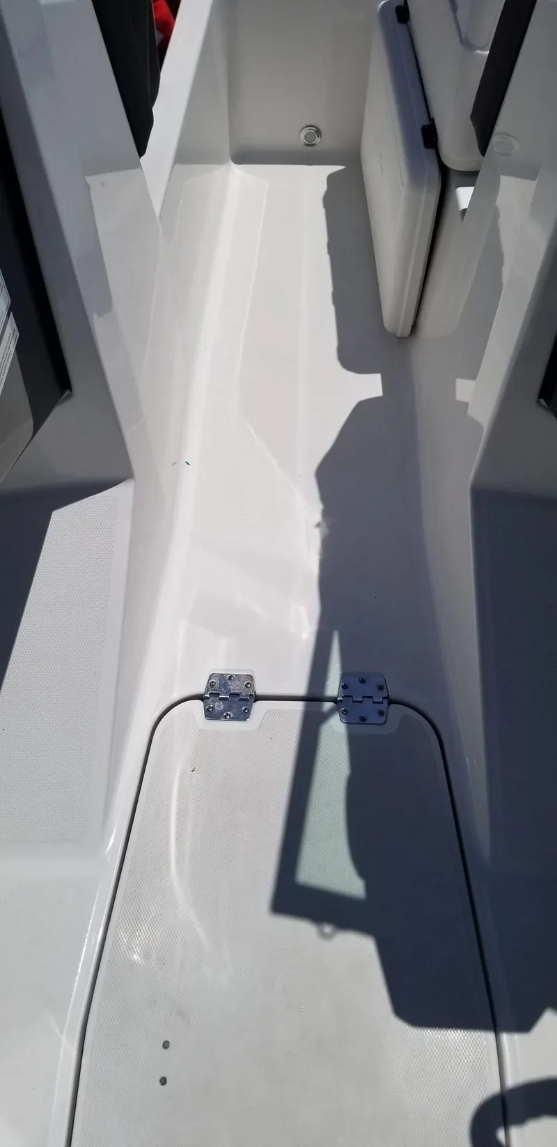 Slide: The Image of 2020 Monterey M205 boat interior with white deck and storage compartments. - 34