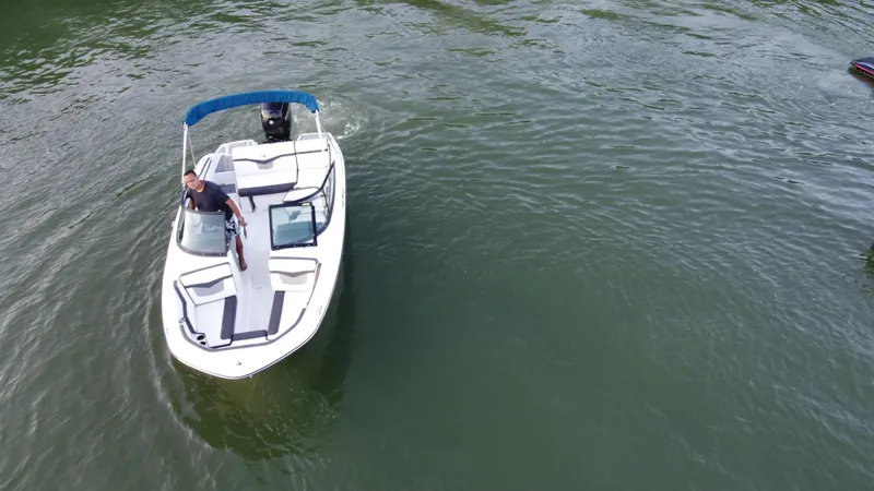 Slide: The Image of Aerial view of a 2020 Monterey M205 boat cruising on water. - 4