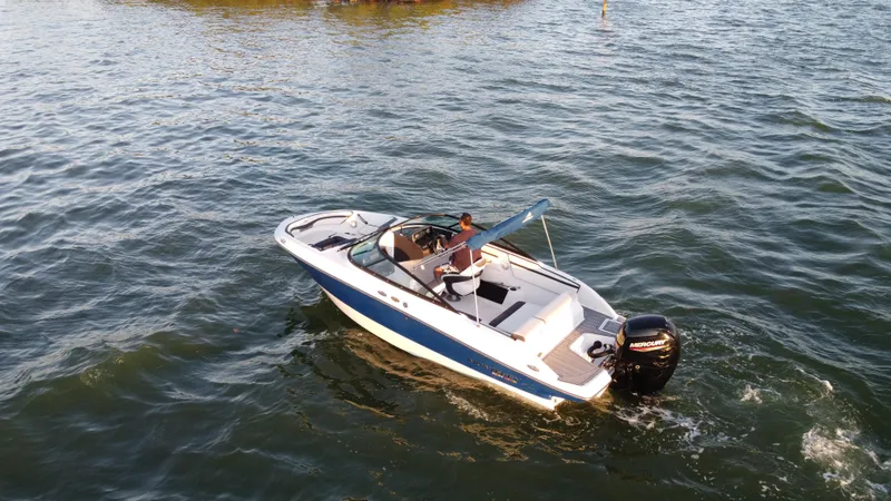 Slide: The Image of 2020 Monterey M205 boat cruising on open water. - 9