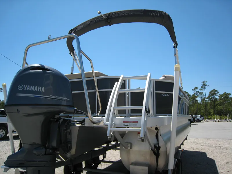 Slide: The Image of 2017 Bennington 22SLX pontoon boat with Yamaha outboard motor. - 5