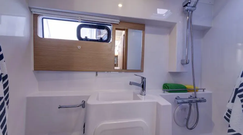 Slide: The Image of 2016 Nautitech 40 Open yacht bathroom with modern fixtures and wooden accents. - 10