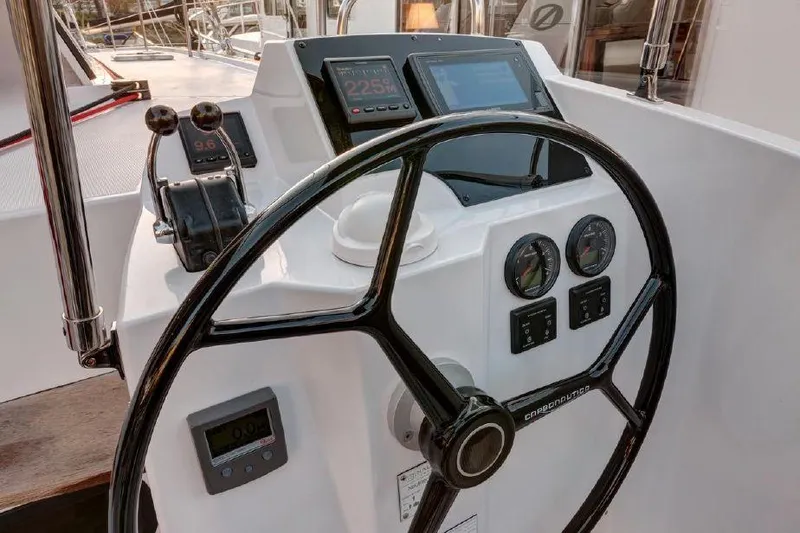Slide: The Image of Helm station of 2016 Nautitech 40 Open catamaran with navigation instruments. - 14