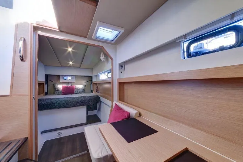 Slide: The Image of Interior of 2016 Nautitech 40 Open catamaran with modern furnishings and cozy bedroom. - 5