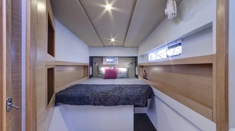 Slide: The Image of Nautitech 40 Open 2016 model interior cabin with bed and modern lighting. - 6