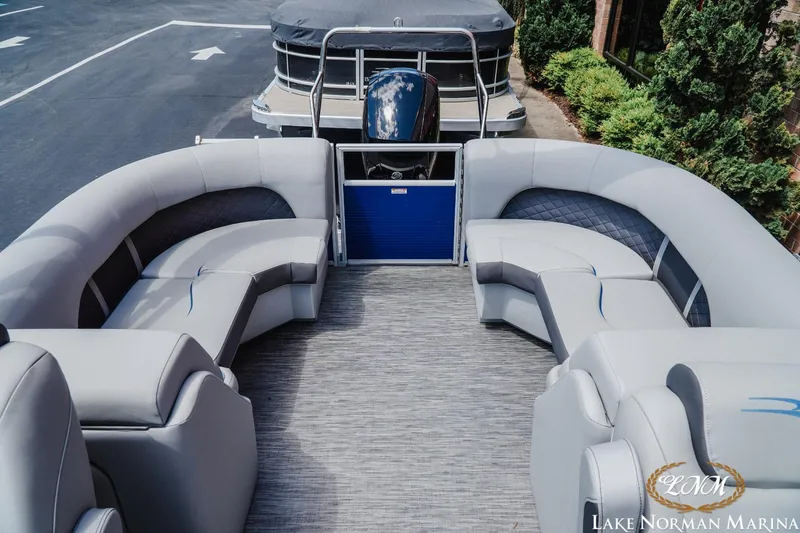 Slide: The Image of 2023 Bennington 23LSR pontoon boat with spacious seating at Lake Norman Marina. - 14
