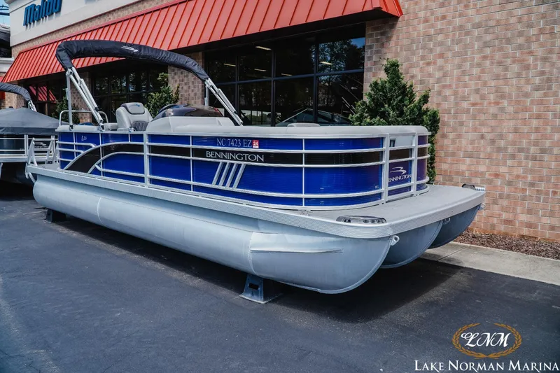 Slide: The Image of 2023 Bennington 23LSR pontoon boat at Lake Norman Marina. - 2