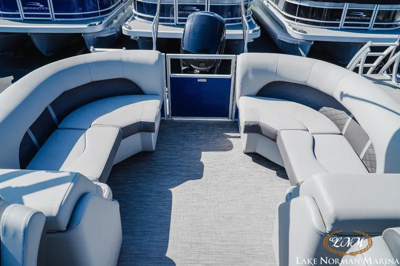 Slide: The Image of 2023 Bennington 23LSR pontoon boat interior with spacious seating at Lake Norman Marina. - 13