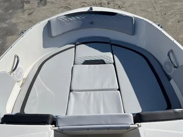 Slide: The Image of 2024 Bayliner Element M19 boat bow seating area with cushioned seats. - 9