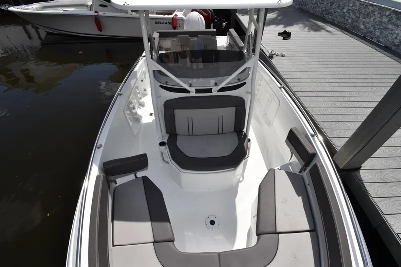 Slide: The Image of 2022 Jeanneau 7.5 Leader boat with spacious seating and modern design. - 3
