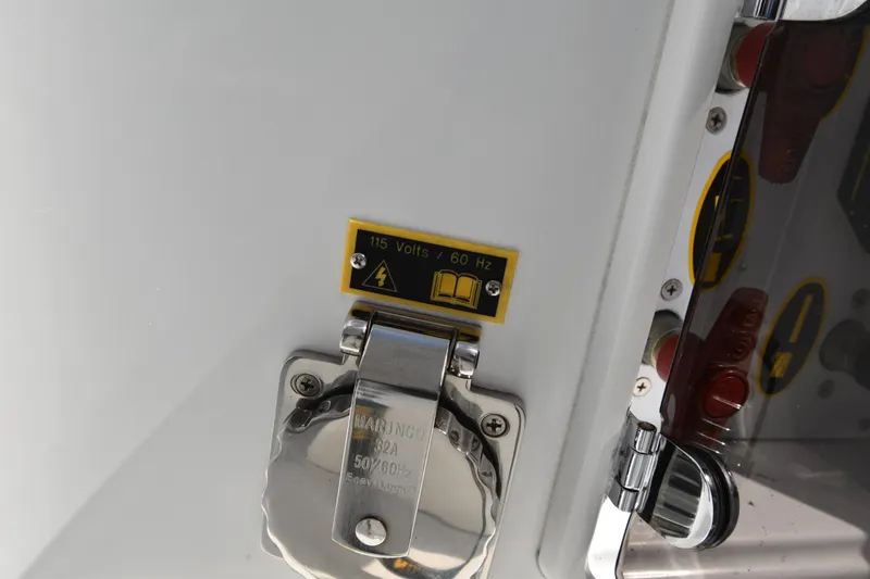 Slide: The Image of Close-up of electrical outlet on 2022 Jeanneau 7.5 Leader boat. - 9