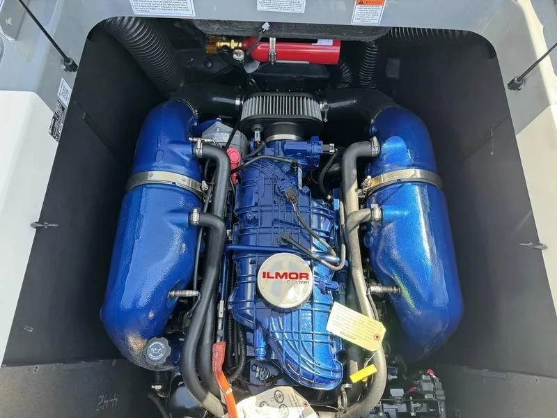 Slide: The Image of 2022 MasterCraft XT24 Ilmor engine in boat compartment. - 37