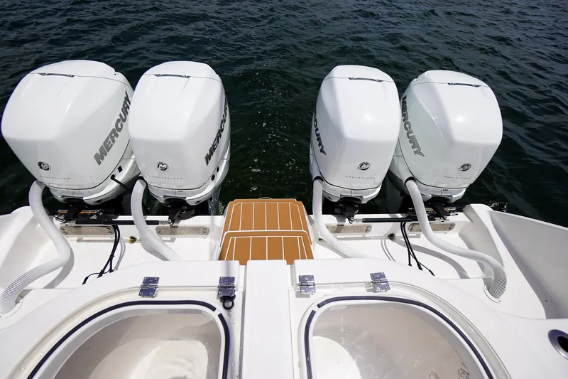 Slide: The Image of Four Mercury outboard engines on a 2020 Invincible 40 Catamaran. - 5