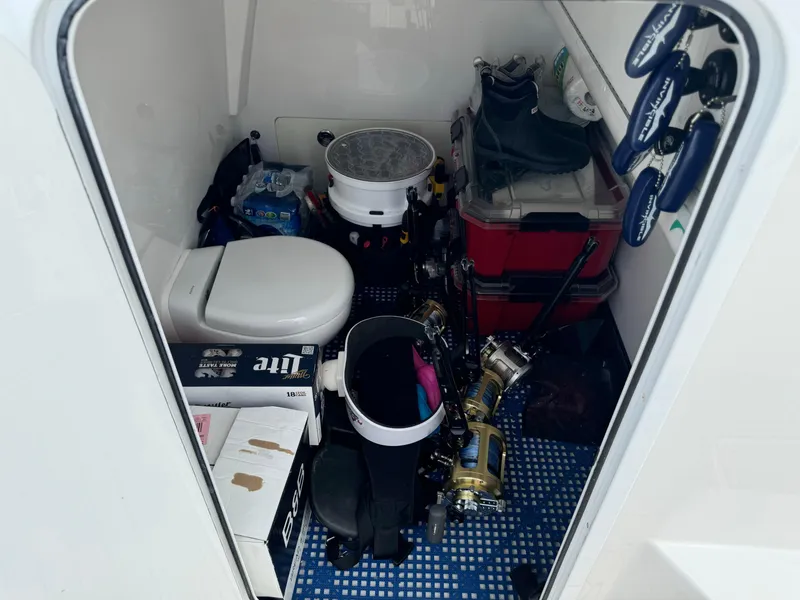 Slide: The Image of Storage area on 2020 Invincible 40 Catamaran with fishing gear and supplies. - 8