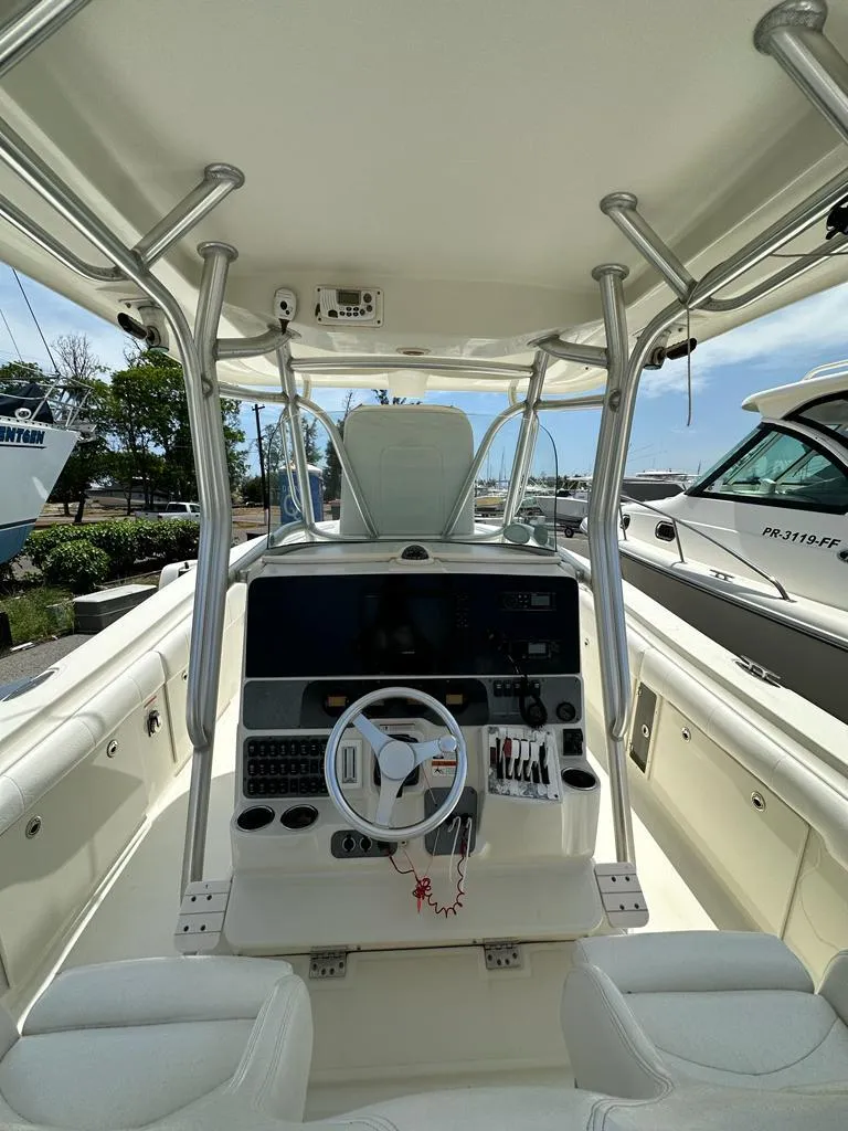 Slide: The Image of 2007 Hydra-Sports Vector 3300 CC boat cockpit with steering wheel and controls. - 7