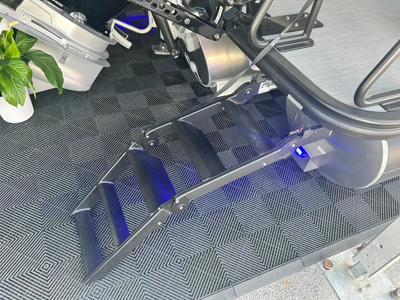 Slide: The Image of 2024 Bennington 28 QXSBA x1 boat with illuminated boarding steps. - 11