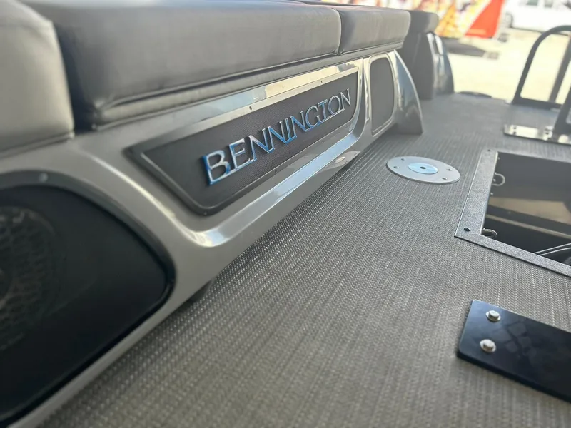 Slide: The Image of 2024 Bennington 28 QXSBA x1 boat interior detail with logo. - 13