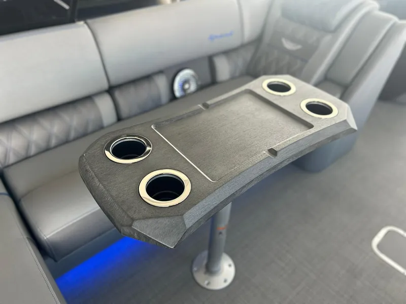 Slide: The Image of Luxury seating and table with cup holders in 2024 Bennington 28 QXSBA x1 boat. - 16