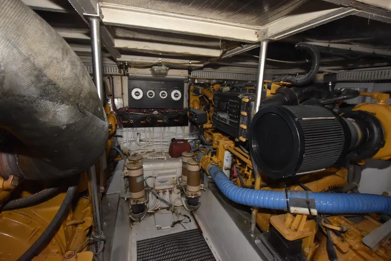 Slide: The Image of Engine room of a 1987 Hatteras SportFish boat with CAT engines. - 30