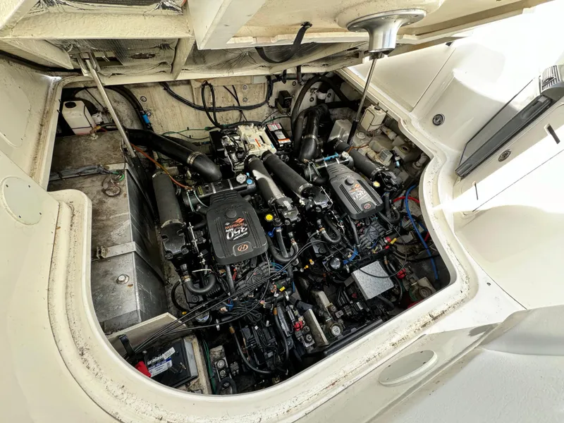 Slide: The Image of Engine compartment of a 2006 Sea Ray 320 Sundancer boat. - 31