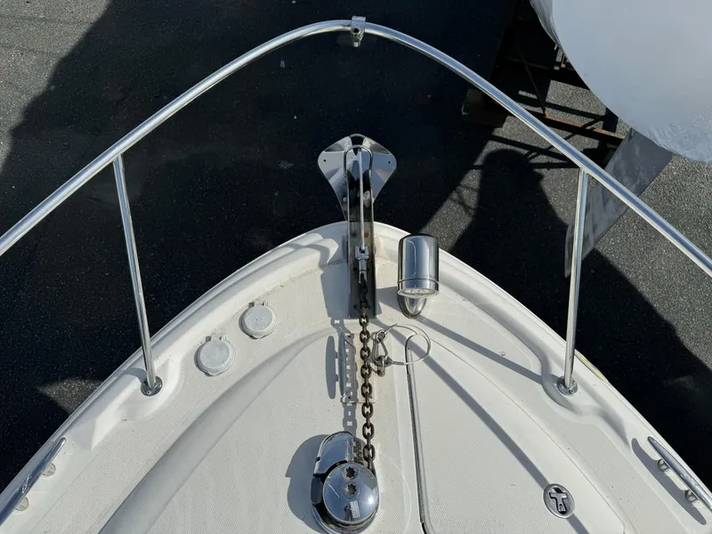 Slide: The Image of Bow of 2006 Sea Ray 320 Sundancer with anchor and chain. - 8
