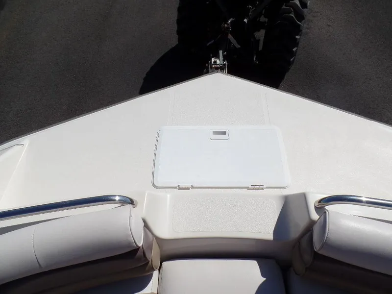 Slide: The Image of 1996 Hurricane Fun Deck boat bow with seating and storage compartment. - 3