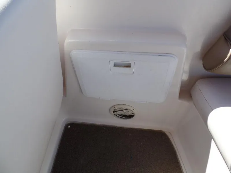 Slide: The Image of 1996 Hurricane Fun Deck storage compartment on boat interior. - 8