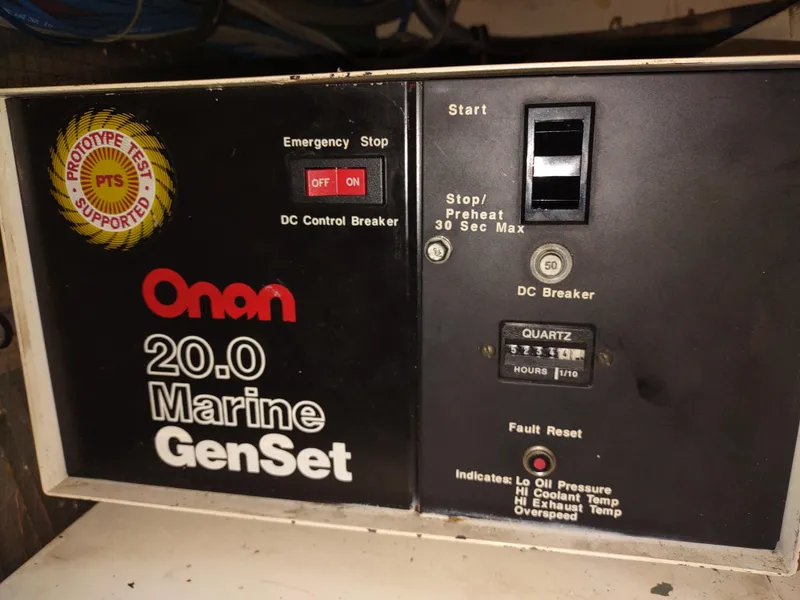 Slide: The Image of Onan 20.0 Marine GenSet control panel on a 1995 Hatteras 52 Cockpit Motor Yacht. - 39
