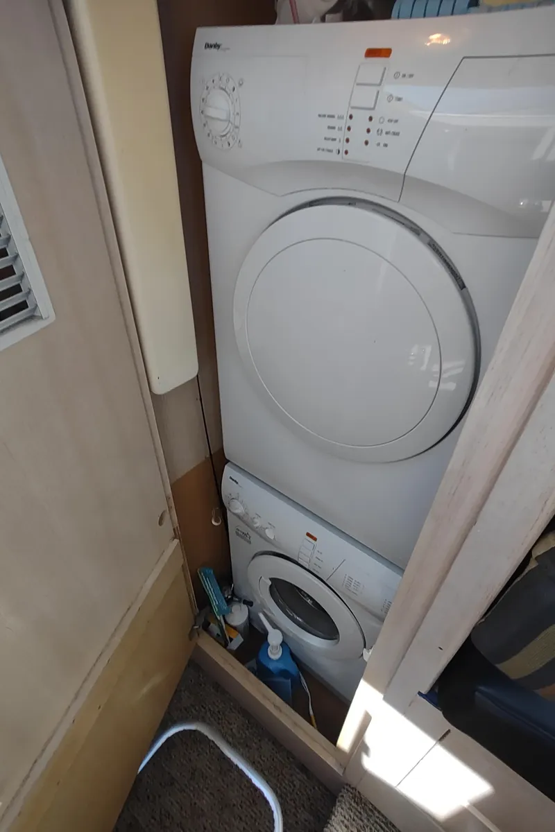 Slide: The Image of Stacked washer and dryer in 1995 Hatteras 52 Cockpit Motor Yacht. - 49
