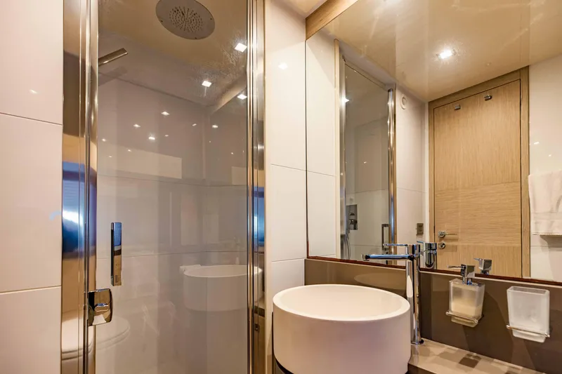 Slide: The Image of Modern bathroom on a 2017 Ferretti Yachts 750, featuring a sleek shower and stylish sink. - 34