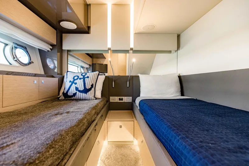 Slide: The Image of Twin cabin in a 2017 Ferretti Yachts 750, featuring cozy beds and nautical decor. - 37
