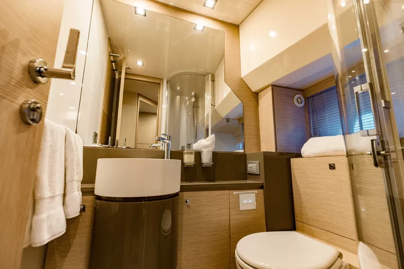 Slide: The Image of Luxurious bathroom in a 2017 Ferretti Yachts 750 model, featuring modern fixtures and elegant design. - 38