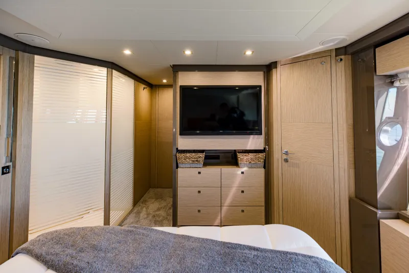 Slide: The Image of Luxurious bedroom interior of 2017 Ferretti Yachts 750 with TV and modern decor. - 44