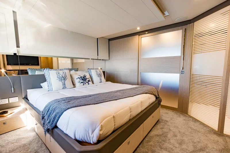 Slide: The Image of Luxurious bedroom interior of 2017 Ferretti Yachts 750 with modern design and cozy bedding. - 45