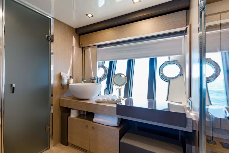 Slide: The Image of Luxurious bathroom on a 2017 Ferretti Yachts 750 with modern fixtures and ocean view. - 47
