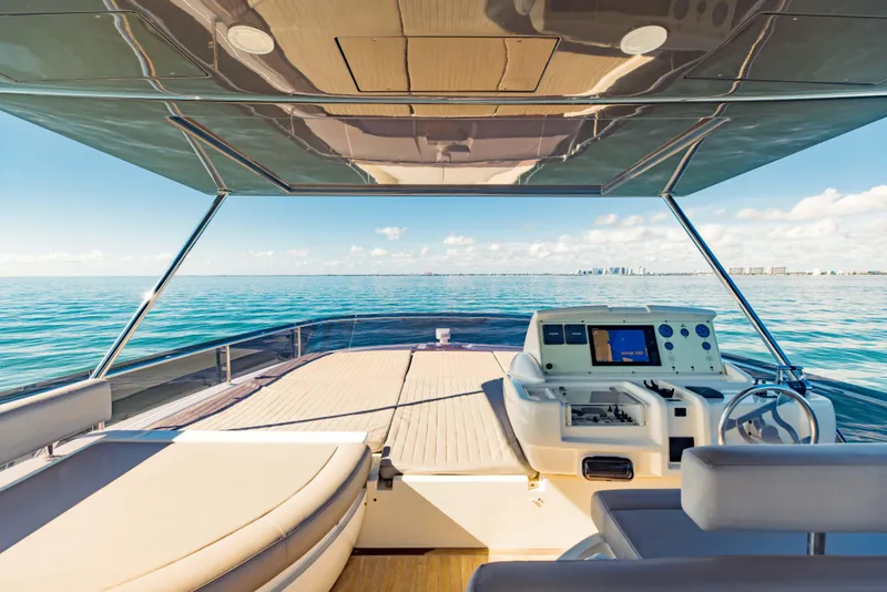 Slide: The Image of 2017 Ferretti Yachts 750 flybridge with ocean view and modern helm station. - 7