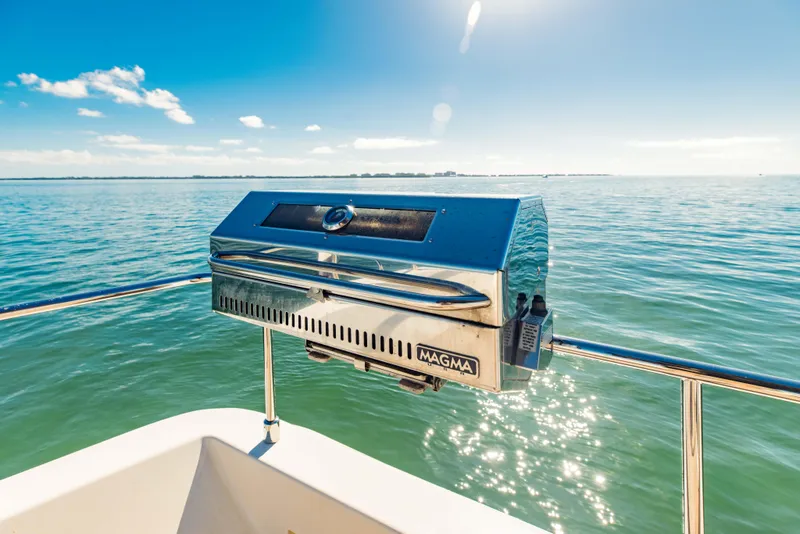 Slide: The Image of Stainless steel grill on a 2017 Ferretti Yachts 750, overlooking serene ocean waters. - 8