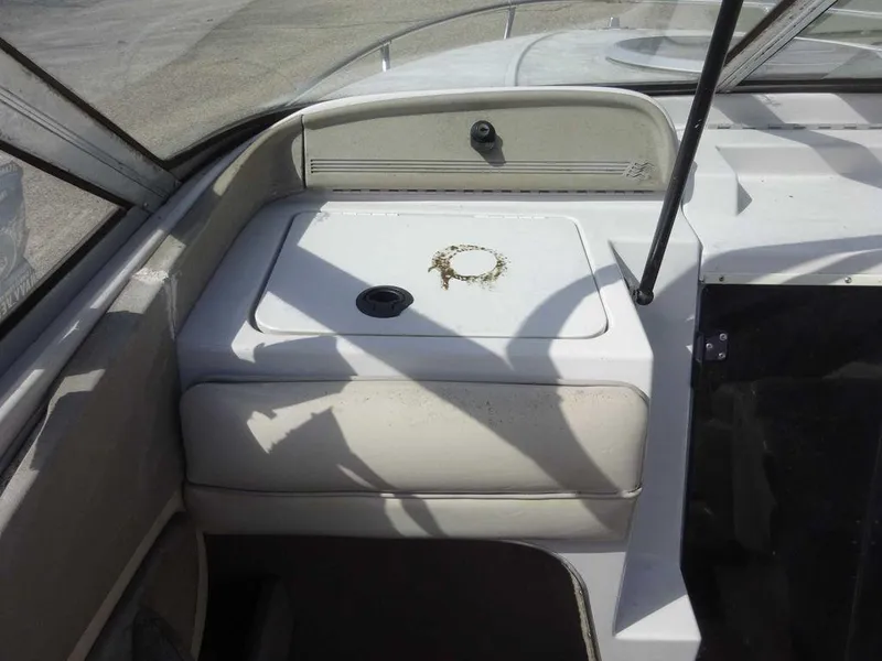 Slide: The Image of 1995 Four Winns 205 Sundowner boat interior dashboard and storage compartment. - 14