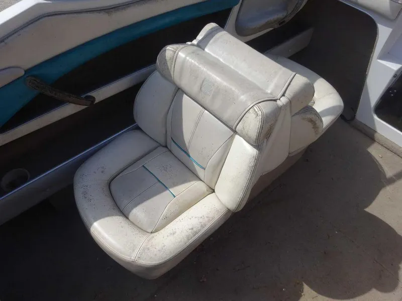 Slide: The Image of Worn seat of a 1995 Four Winns 205 Sundowner boat. - 7