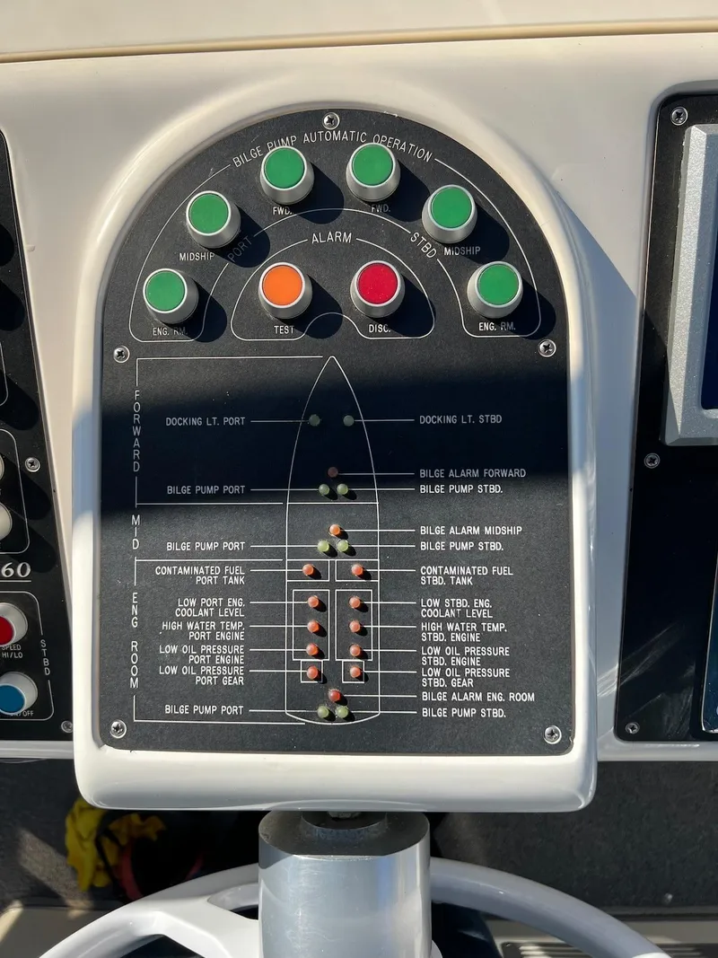 Slide: The Image of Control panel of a 1990 Tempest Offshore Sport Yacht with bilge pump indicators. - 16