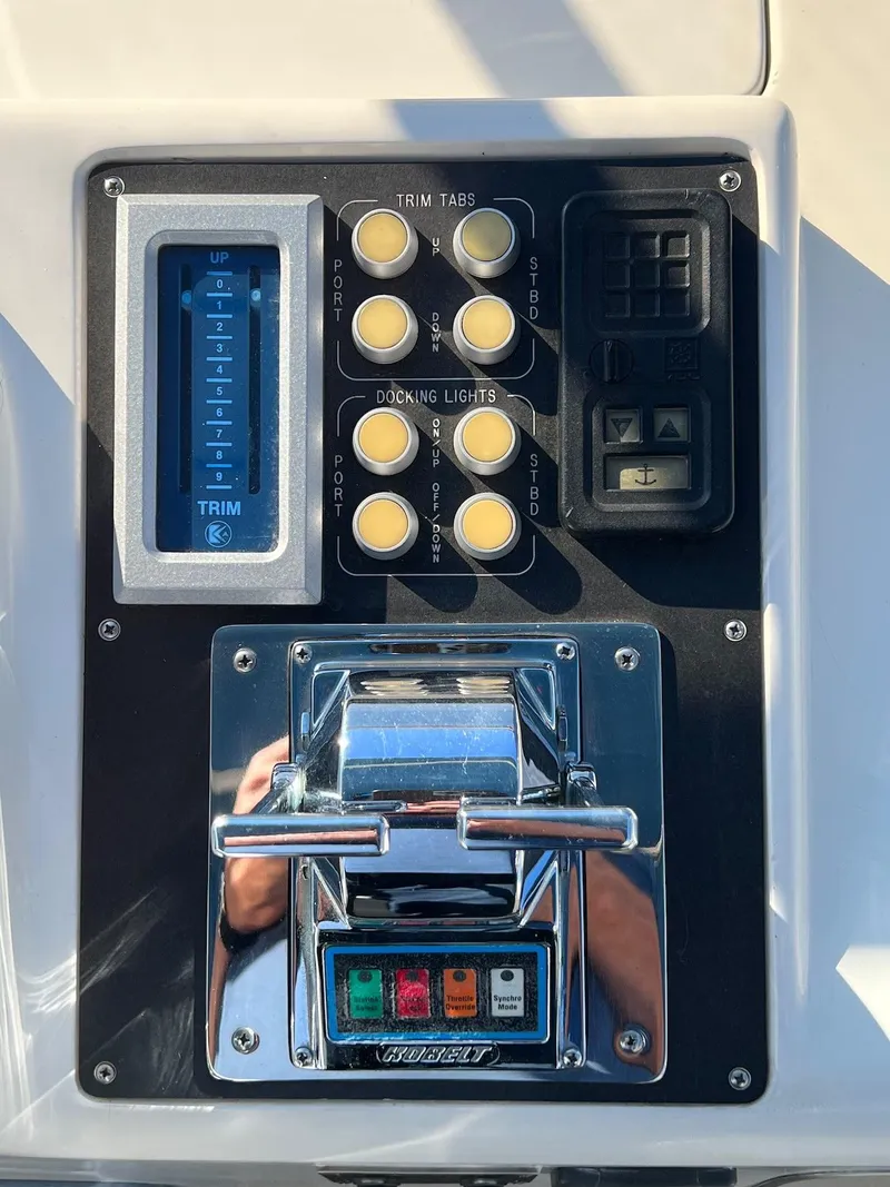 Slide: The Image of Control panel of a 1990 Tempest Offshore Sport Yacht with trim tabs and docking lights. - 17