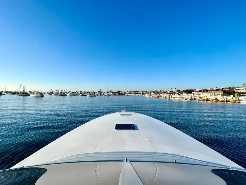 Slide: The Image of View from the bow of a 1990 Tempest Offshore Sport Yacht in a marina. - 3