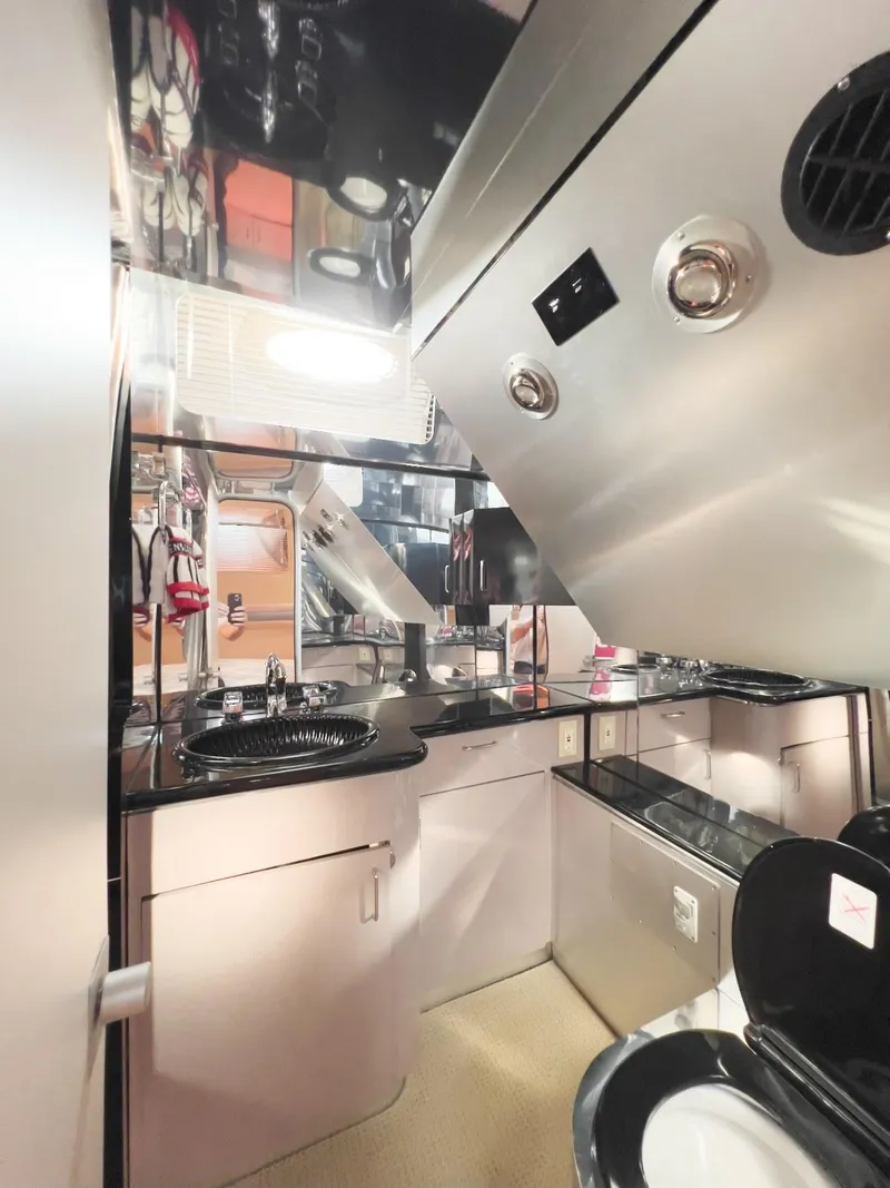 Slide: The Image of 1990 Tempest Offshore Sport Yacht bathroom with modern fixtures and sleek design. - 30