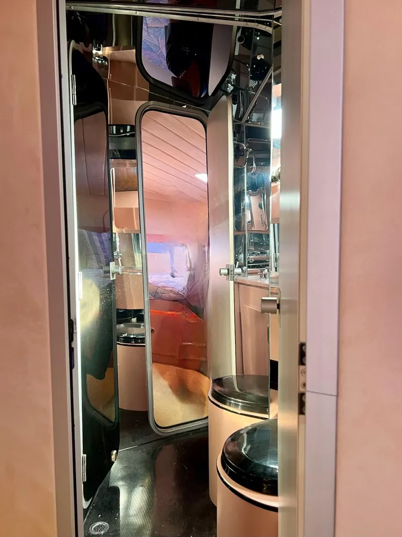 Slide: The Image of Interior of a 1990 Tempest Offshore Sport Yacht with modern amenities and sleek design. - 36