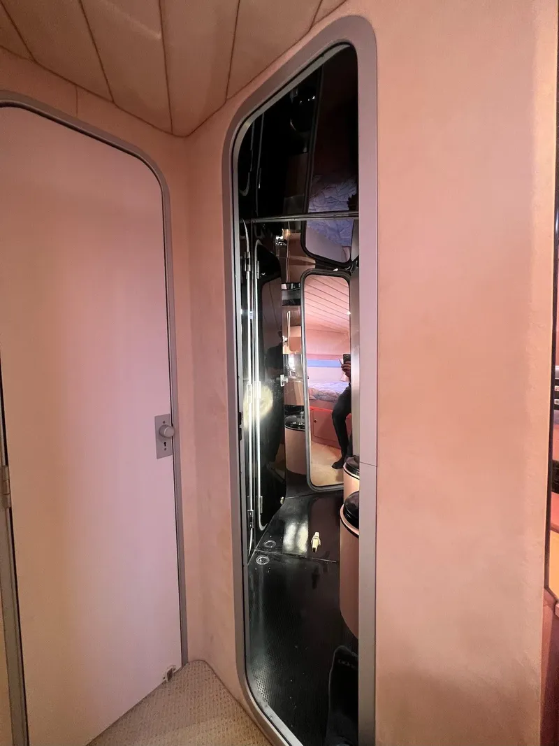 Slide: The Image of Interior of a 1990 Tempest Offshore Sport Yacht with modern design elements. - 37