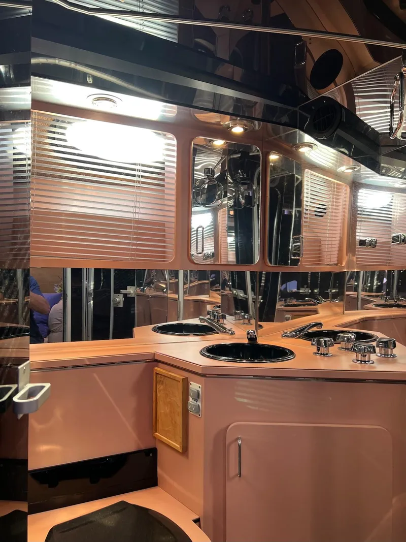 Slide: The Image of Luxurious bathroom interior of a 1990 Tempest Offshore Sport Yacht with modern fixtures. - 39