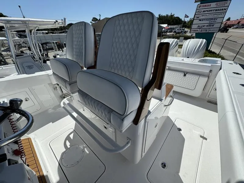 Slide: The Image of 2024 Southport 30 FE boat interior with luxurious seating. - 23
